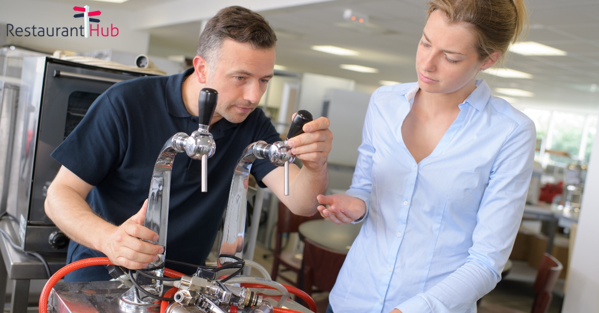 male technician fixing beer tap